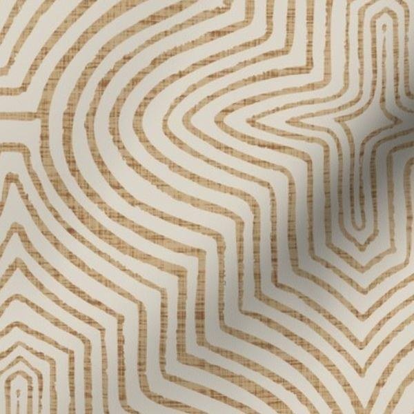 Printed pattern of flowing contour lines in sand on a linen texture